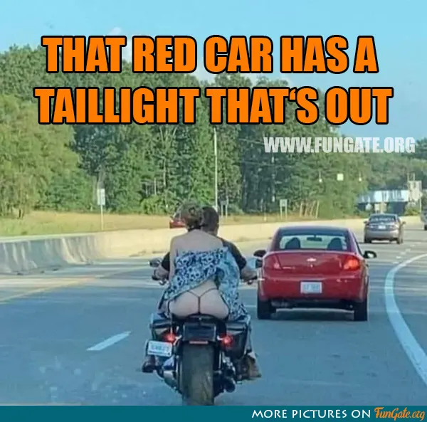 That red car has a taillight that's out